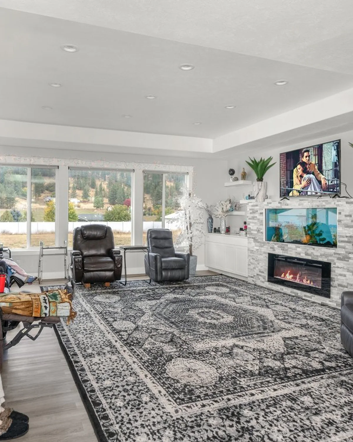 Shared living room and fireplace at A+ Quality Adult Family Home