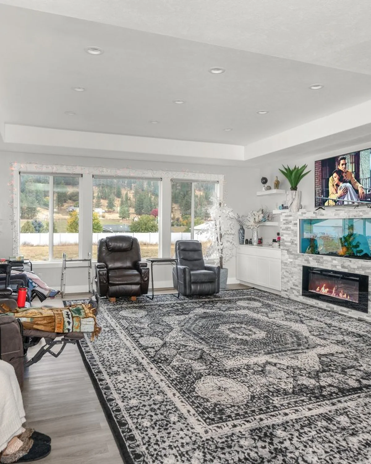 Shared living room and fireplace at A+ Quality Adult Family Home